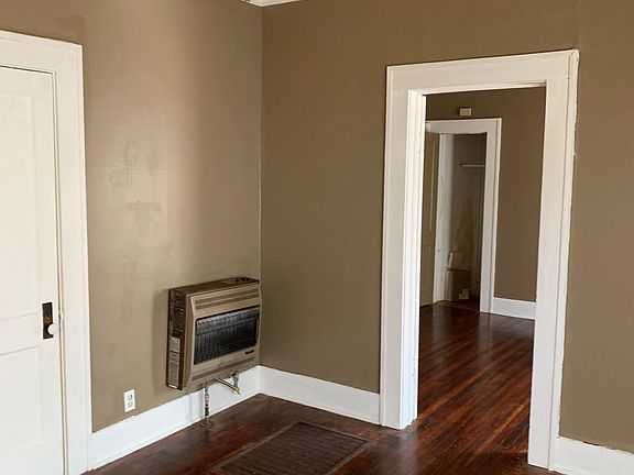 Living room and entrance to bedroom