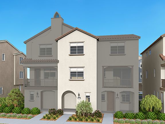 A multi-story residential building with a distinctive architectural style, surrounded by lush greene