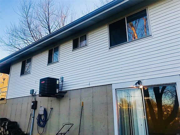Walk out basement to the fenced in backyard! Brand new AC unit!