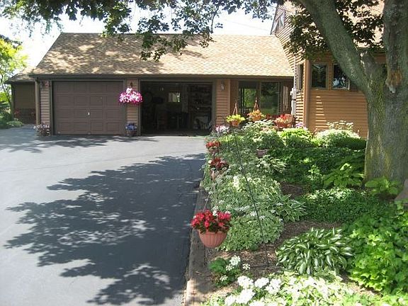 2 car garage; 1.5 car garage behind