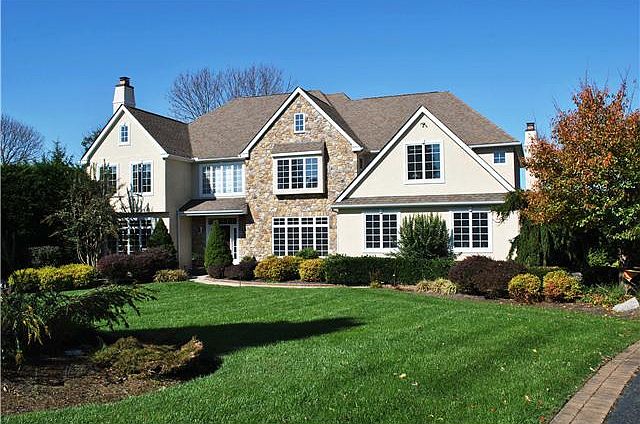 Stone & Stucco home featuring 100% new stucco.