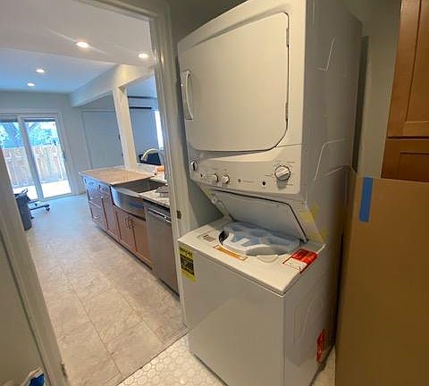Laundry room and pantry off kitchen leading to the carport on the west side.