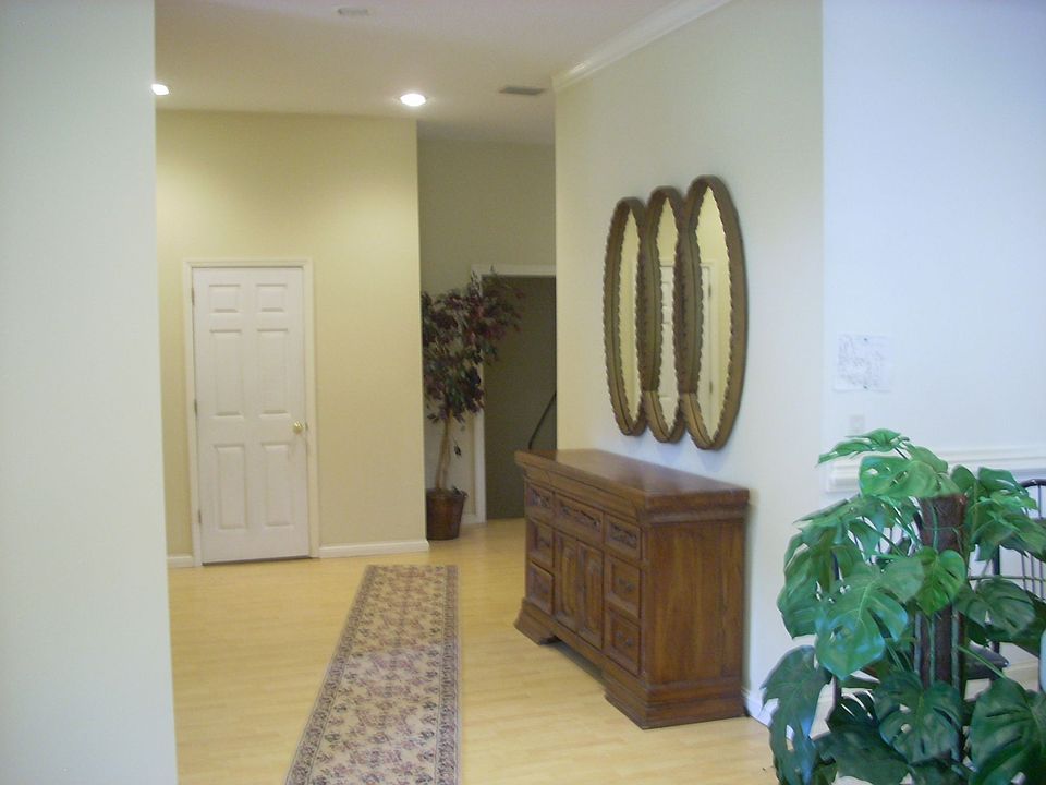 CURVED HALLWAY TO WEST SIDE OF HOME