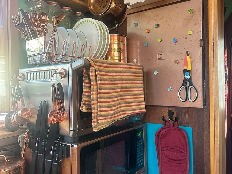A toaster oven and microwave are available for cooking, along with a 1-burner induction cooktop (with copper pots and pans, of course!)