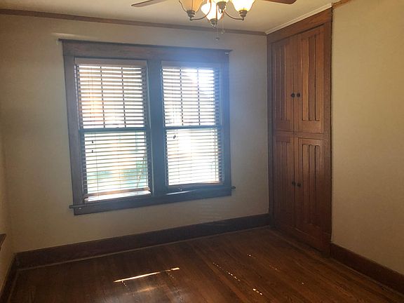 master with closet overlooks backyard