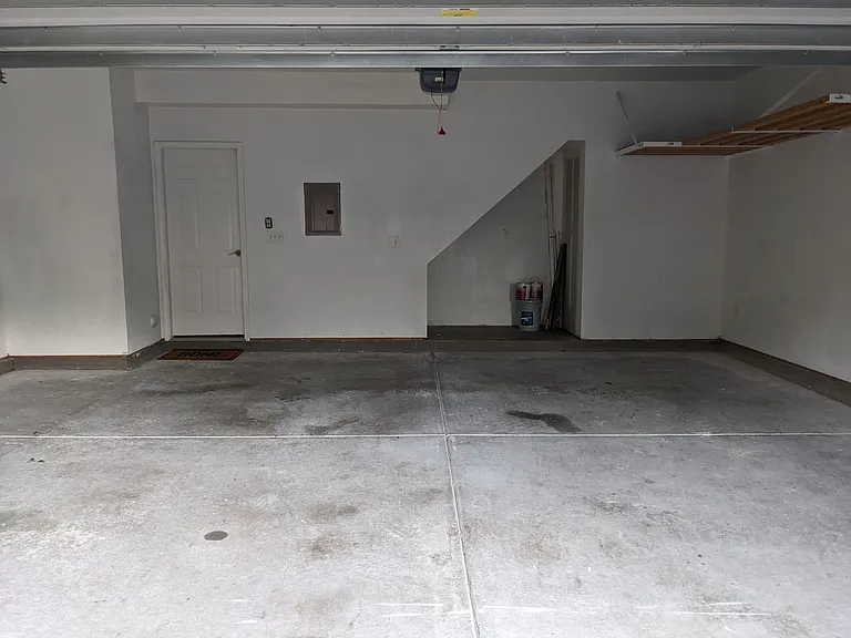 Two car garage with additional storage rack