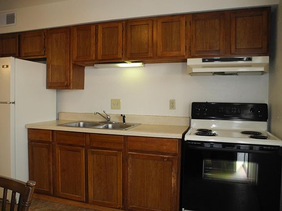 Updated cabinets and modern appliances