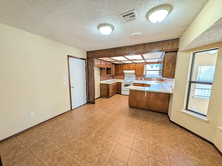 1707 S 138th East Ave — Photo 3
