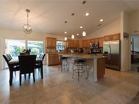 Welcoming open vaulted kitchen with plenty of light.