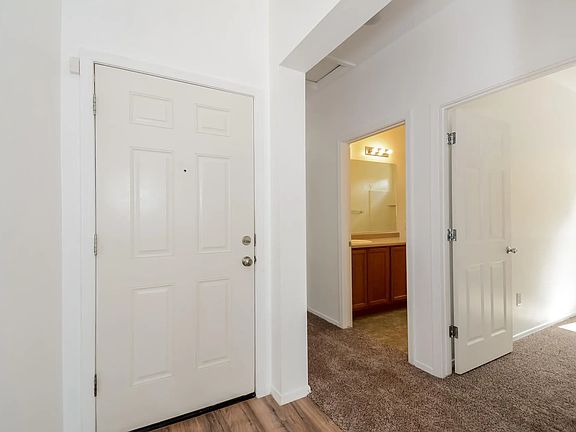 Front Door + Hallway to Bedrooms