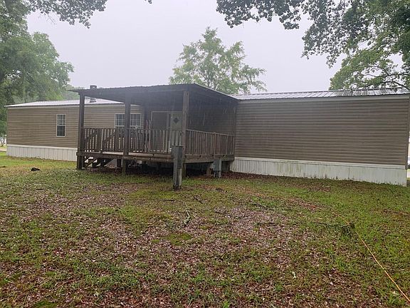 This home has a nice covered back porch!