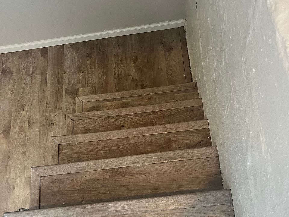 These are normal stairs looking a little steep in this picture.