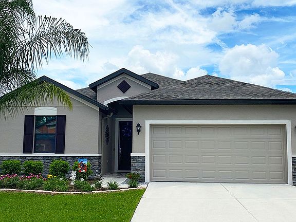 Sweetwater french country elevation 1 with opt stone new home front exterior William Ryan Homes Tamp