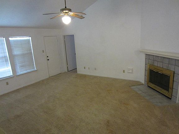 Cozy fire place to go with this spacious living room.