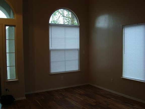 Formal living room, fresh paint, new flooring and new blinds