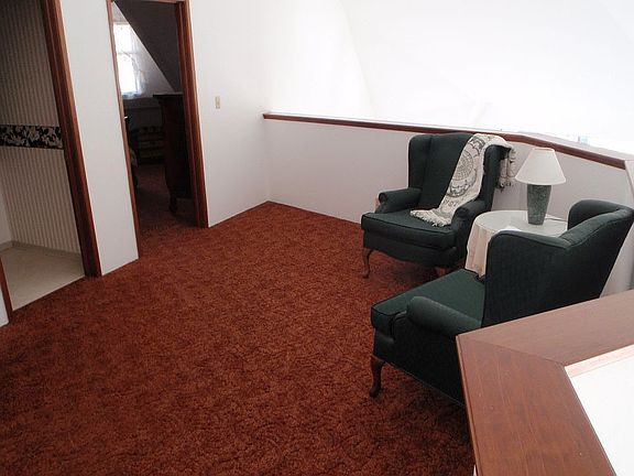 Loft has grerat sitting area or play area for kids