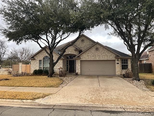 Corner lot home with extended two car garage