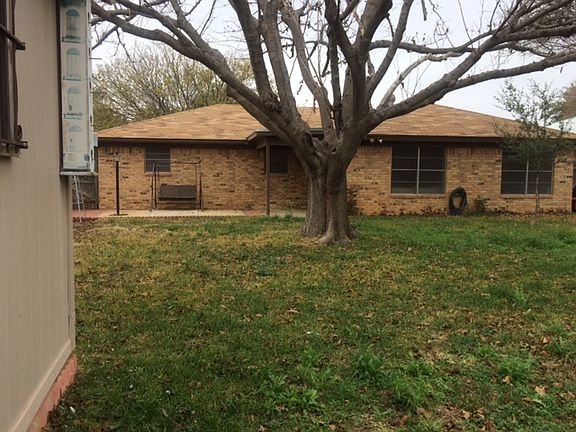 back of home & edge of shed