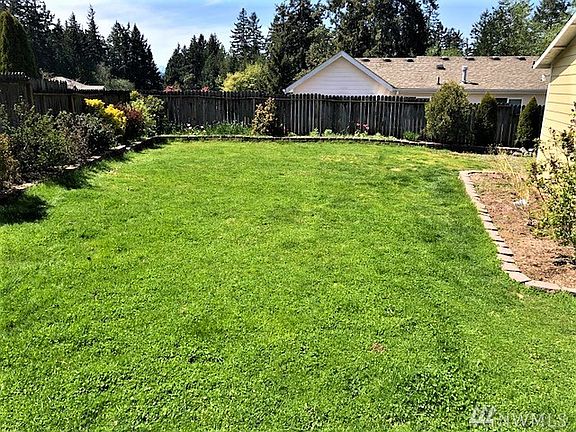 Very spacious lawn yard wraps around 3/4 of the home and is fully fenced!