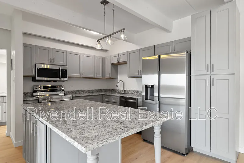 Building Photo - 130 N Pearl St #1002