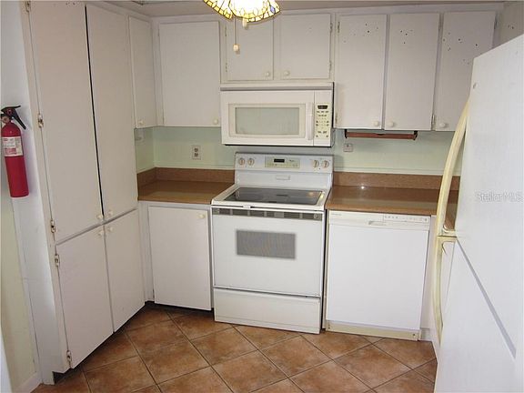 3rd image of 2617 Cove Cay Dr Unit 404
