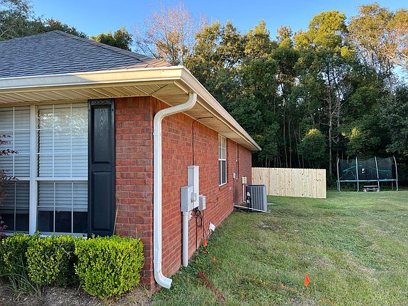 New fully enclosed 6 ft wood privacy fence.