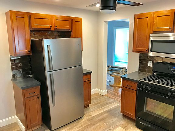 Stainless steel fridge, plenty of cabinets