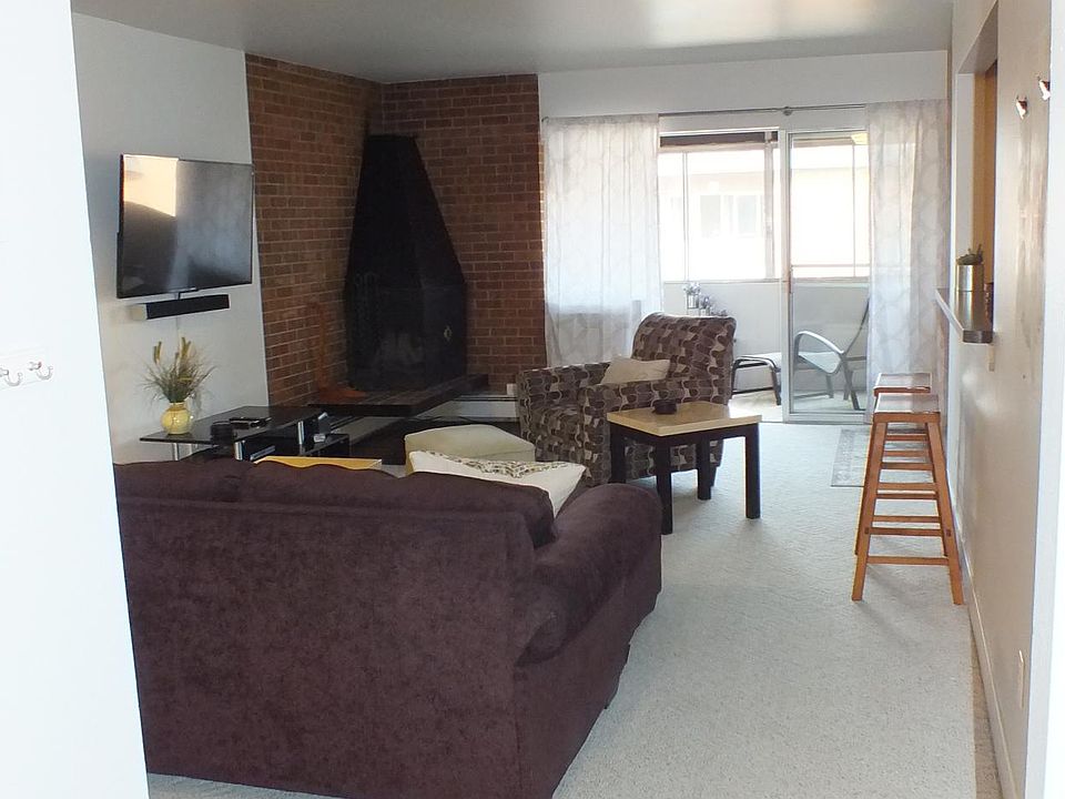 Entry to condo. Wood burning fireplace.