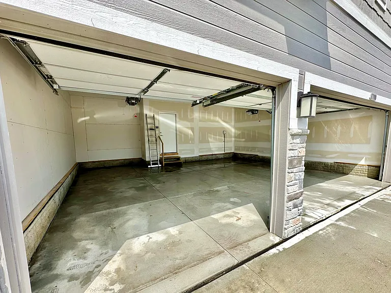 1-car bay in 3 car garage