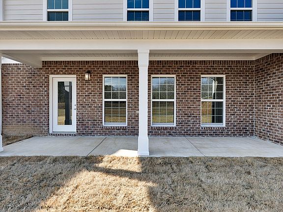 Large covered back porch is perfect for outdoor entertaining