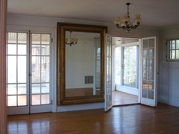 Living room with french doors to sunroom