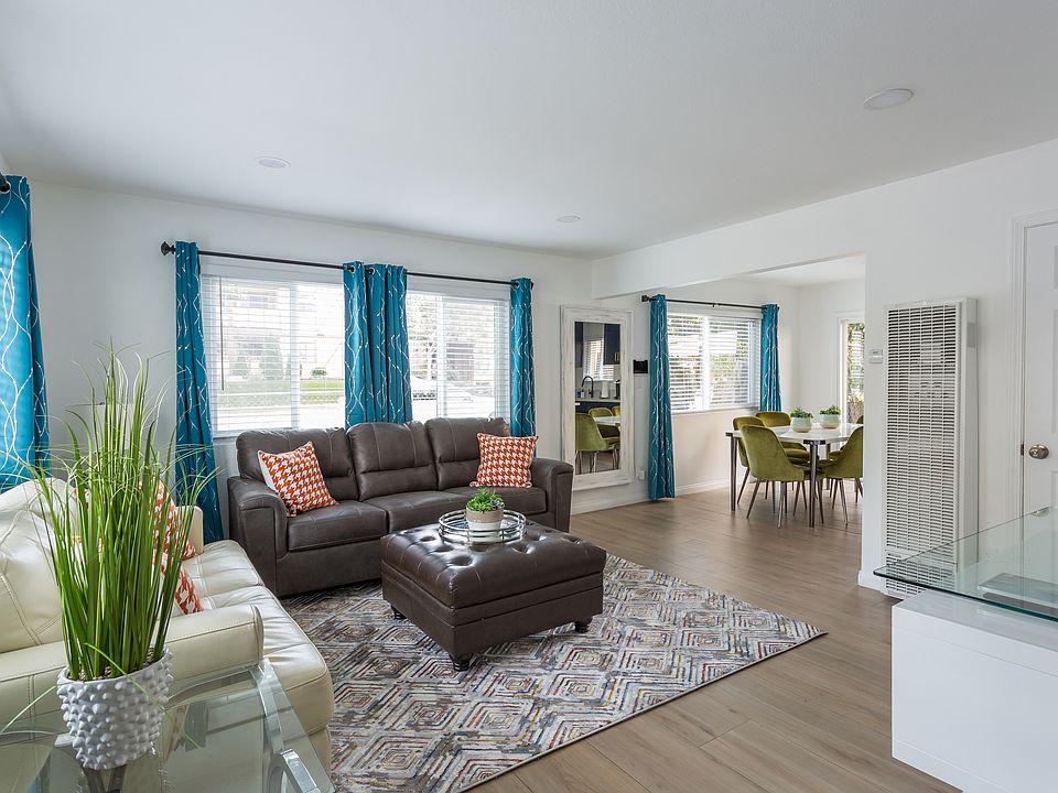 Entrance to the home. Living room with queen sofa sleeper.