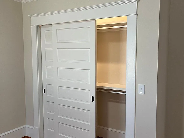 Custom built closet in second bedroom