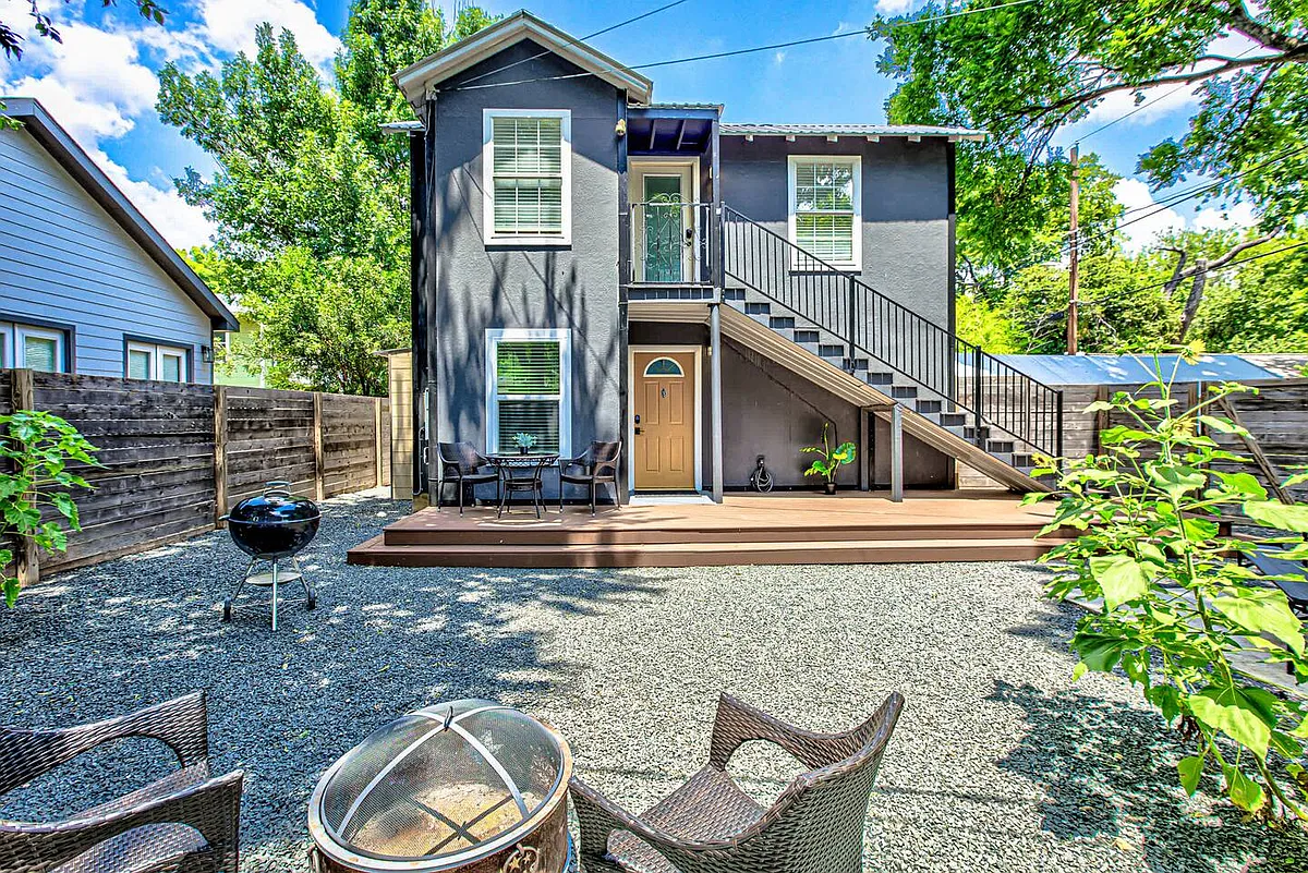 In left hand corner (not seen) is the gate to access Garden St proper. There is legal access through the driveway of 1708 #1-- where garbage bin is taken to the street. - 1708 Garden St
