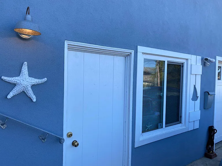 Studio Front Window and Door w/Motion Light Fixture & Security Camera
