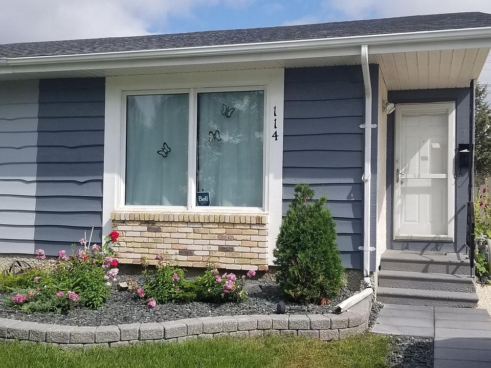 Curb side view of the house