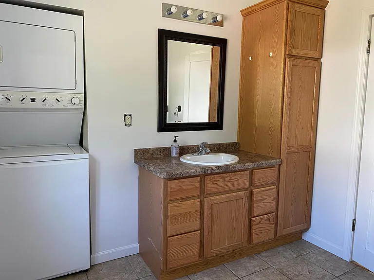 Downstairs bathroom with washer/dryer