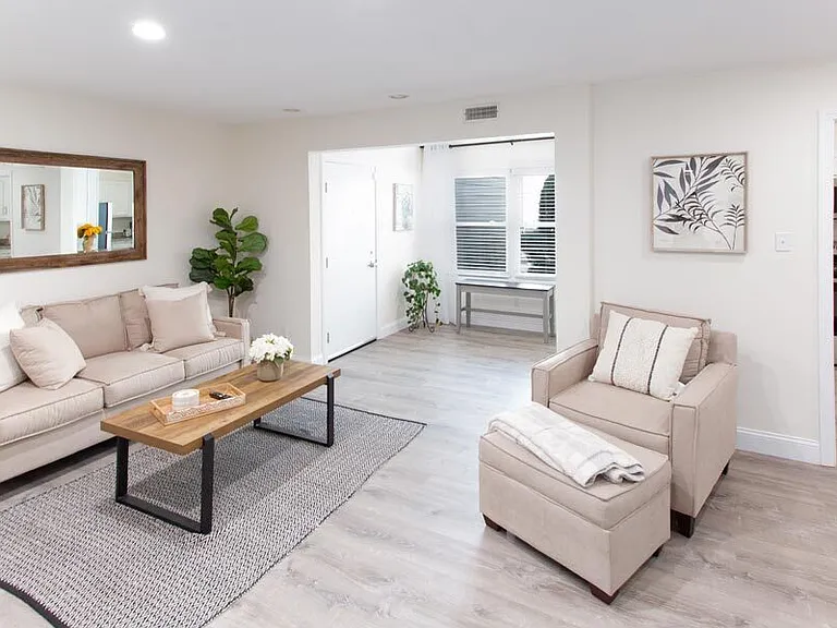 MODEL LIVING ROOM/SUNROOM AREA