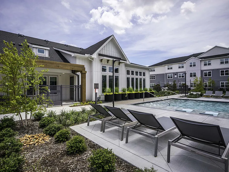 Lush landscaped pool area