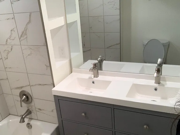 Bathroom with double sink and vanity