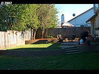 backyard fully fenced with patio and dogrun