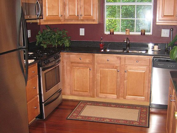 completely updated kitchen - silestone, maple cabinets, hardwoods, ss appl.