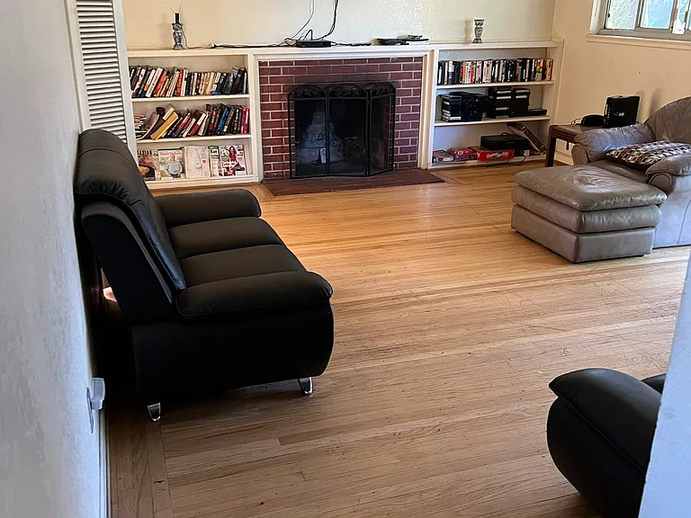 Living room with sliding door to go to outdoor patio and garden