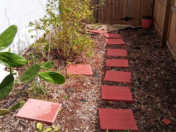 Side of House with Gate Walkway