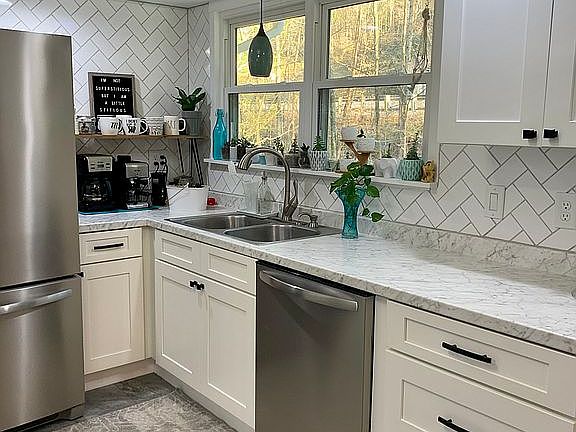 Deep sink telescoping faucet