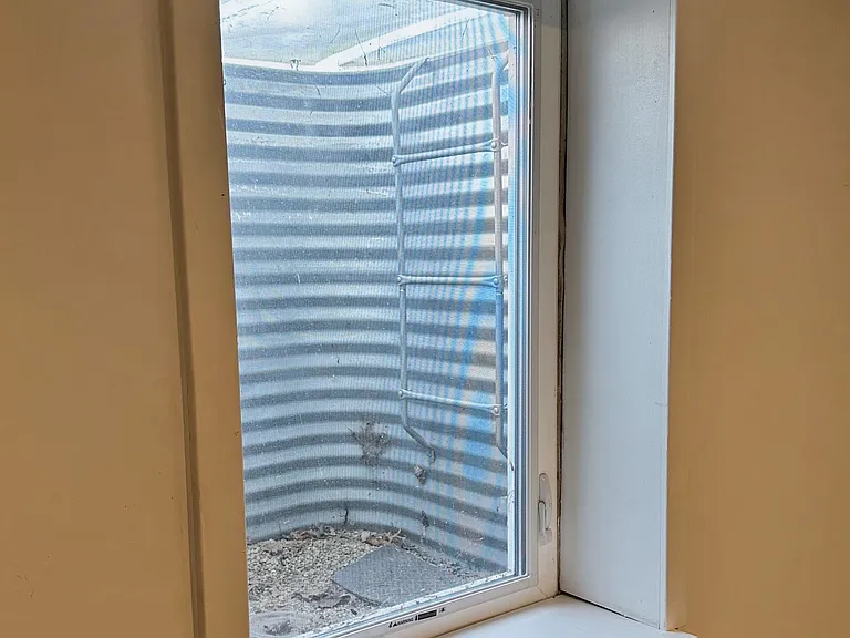 Basement bedroom with emergency egress