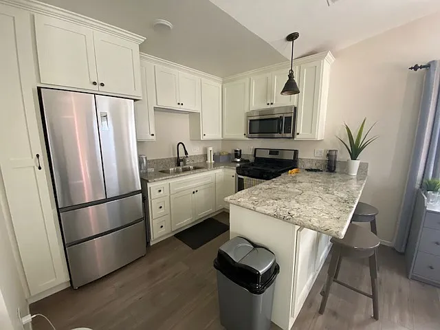 Furniture and refrigerator not included. Studio is rented unfurnished.