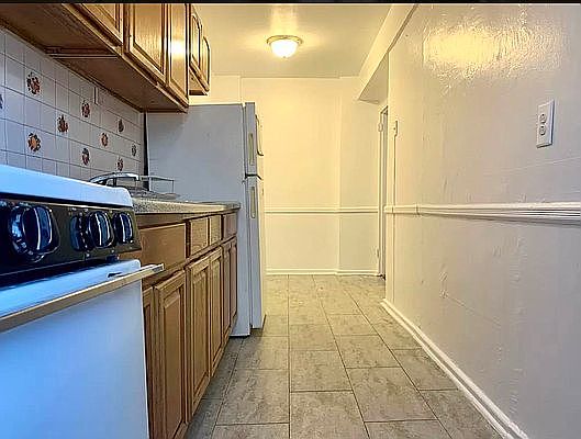 1st image of 63-95 Austin St APT 1E