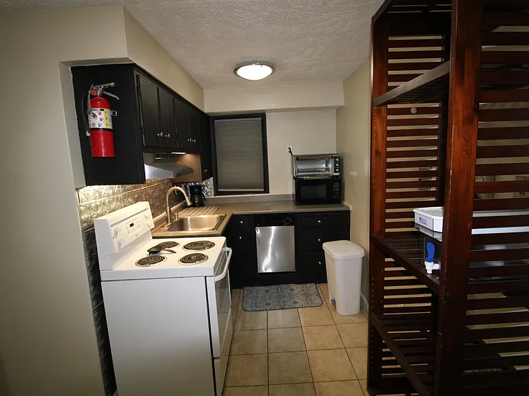 Kitchen with Upgraded Appliances Range and Stainless Dish washer and Microwave