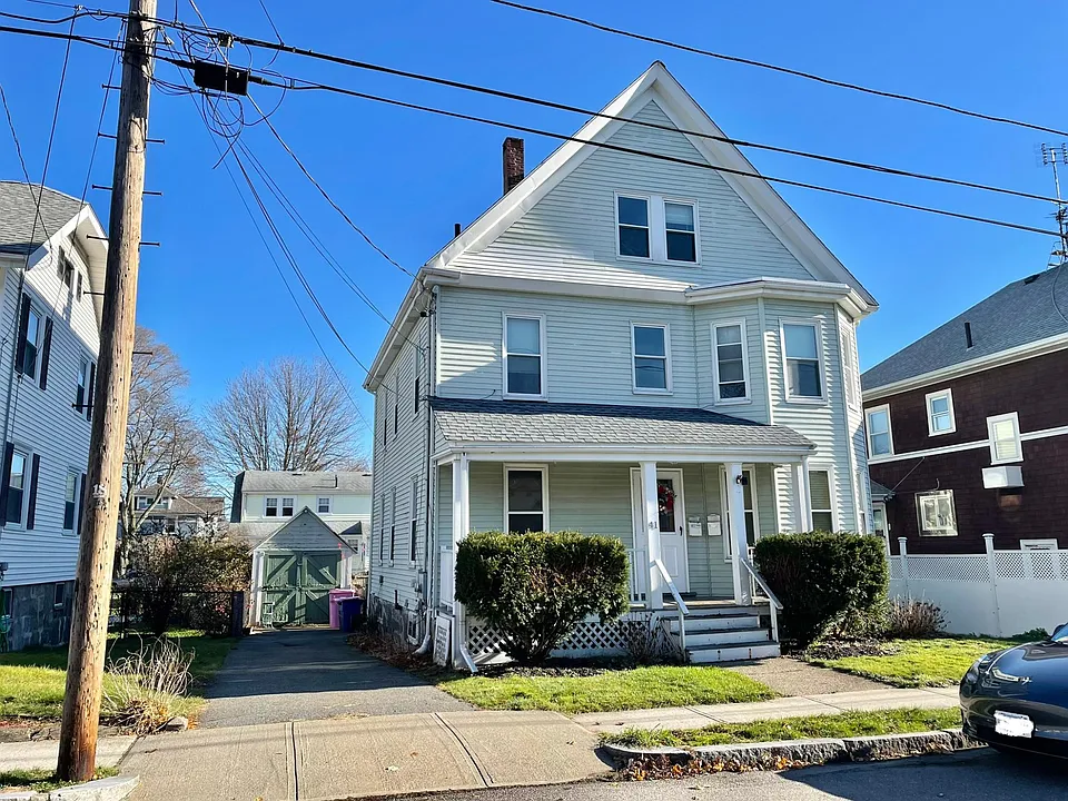 Front of house with parking